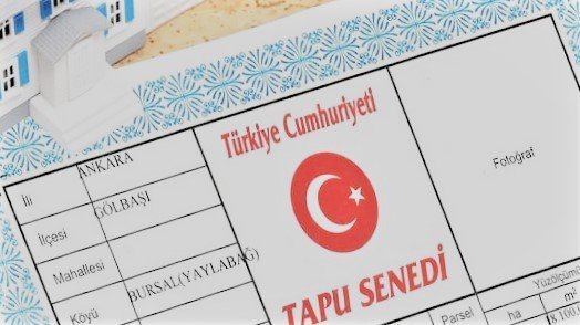If multiple bank receipts are paid in Turkish Lira with different dates are submitted, How is the value of the property calculated?